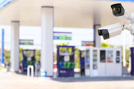 Gas station with security cameras visible