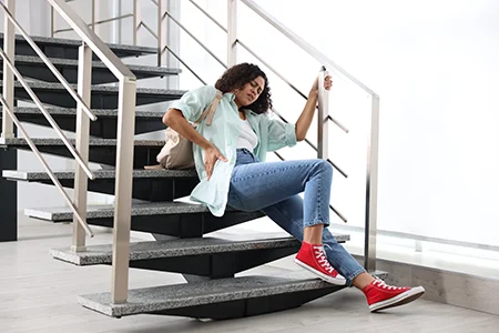 Women slipping on stairs