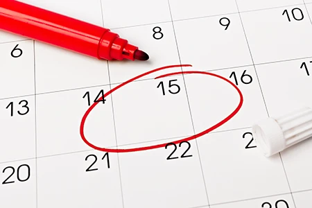 Calendar with date circled with red marker